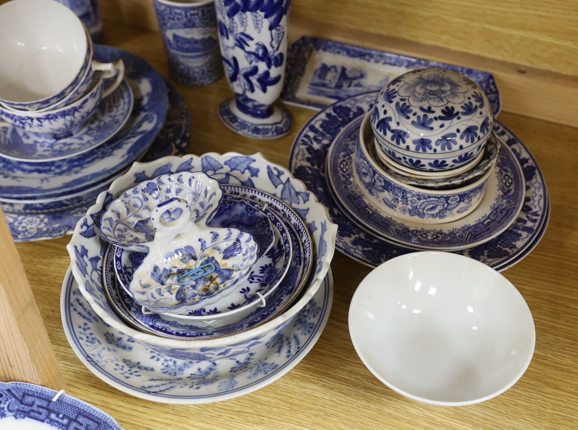 A collection of Chinese and Japanese blue and white jars, export plates and pots, together with European blue and white mixed tea wares